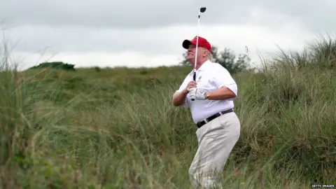 Getty Images Donald Trump playing golf