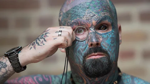 Reuters/Alamy The art still has devout practitioners today, like the man shown here at the International Tattoo Convention in London (Credit: Reuters/Alamy)