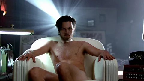 Warner Bros The Aviator also graphically depicted Hughes’ apparent descent into severe mental illness in the later part of his life, in which he kept urine in jars (Credit: Warner Bros)