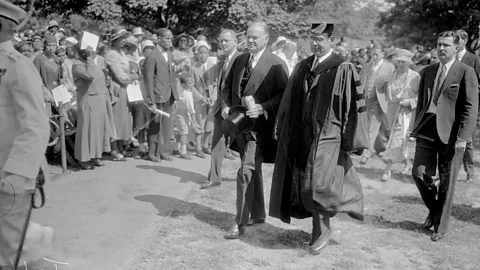 Getty Images Howard University president Mordecai Johnson had ambitious plans; he is shown with US President Hoover at the university’s graduation ceremony (Credit: Getty Images)