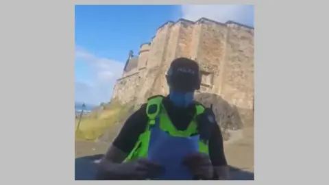 FACEBOOK Screengrab of Facebook video of activists trying to take over Edinburgh Castle
