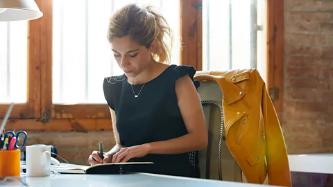 Getty Images Expectations to work outside your remit are now so embedded that many workers fear if they don’t go above and beyond they won't be promoted (Credit: Getty Images)