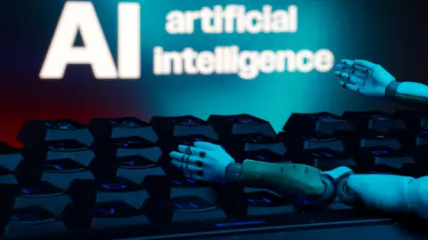 Reuters A message reading "AI artificial intelligence", a keyboard, and robot hands are seen in this illustration taken January 27, 2025. REUTERS/Dado Ruvic/Illustration/File Photo